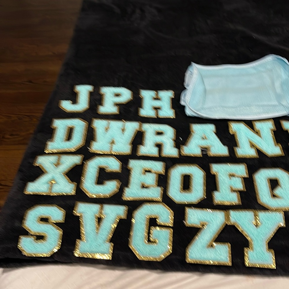 Brand new mint green and gold 26 letter and litt bag to put them